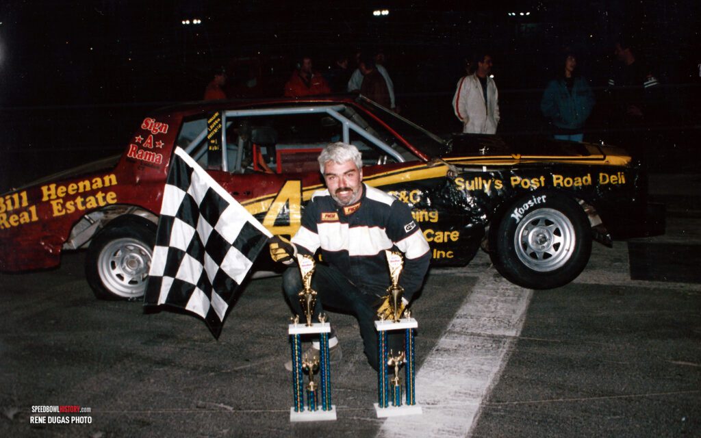 Black and white abstract pattern with concentric circles and wave shapes.