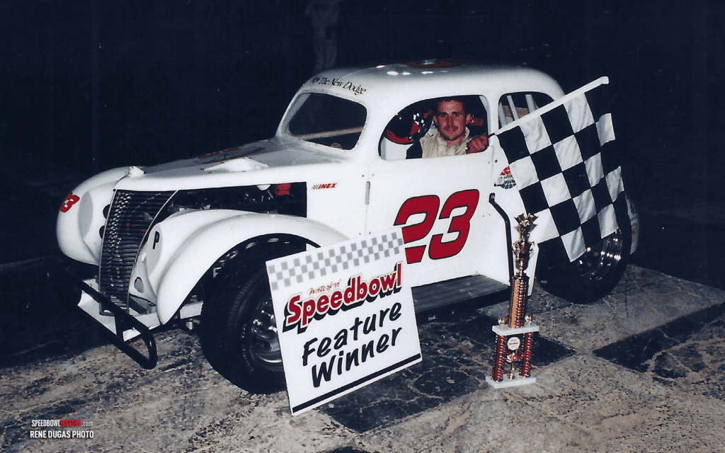 Black and white abstract pattern with concentric circles and wave shapes.