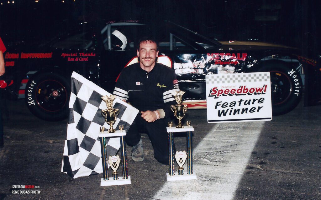 Black and white abstract pattern with concentric circles and wave shapes.