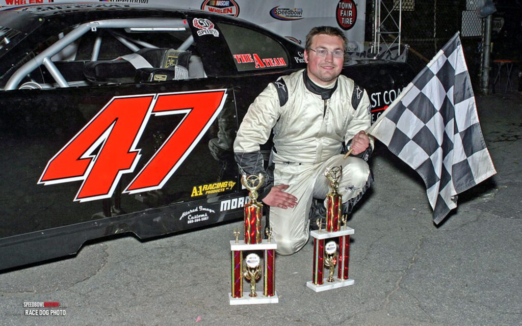 Black and white abstract pattern with concentric circles and wave shapes.