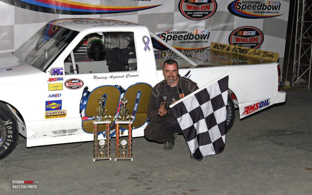 Black and white abstract pattern with concentric circles and wave shapes.