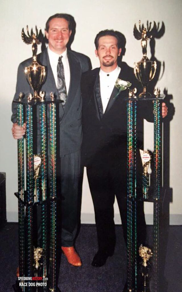 Black and white abstract pattern with concentric circles and wave shapes.