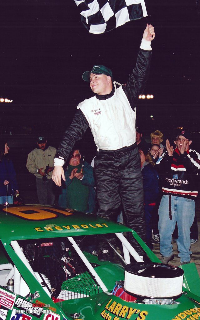 Black and white abstract pattern with concentric circles and wave shapes.