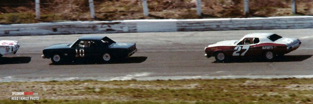 Black and white abstract pattern with concentric circles and wave shapes.