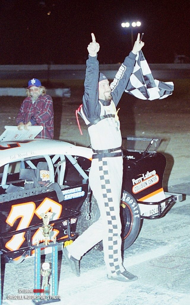 Black and white abstract pattern with concentric circles and wave shapes.