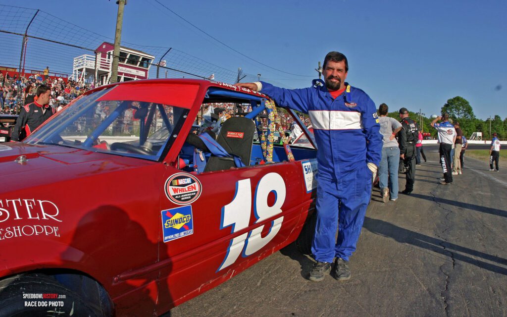 Black and white abstract pattern with concentric circles and wave shapes.