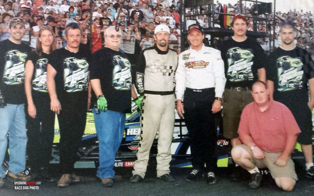 Black and white abstract pattern with concentric circles and wave shapes.