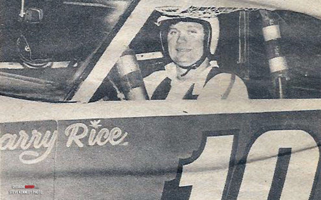 Black and white abstract pattern with concentric circles and wave shapes.