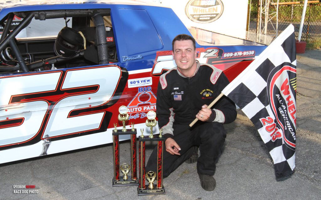 Black and white abstract pattern with concentric circles and wave shapes.