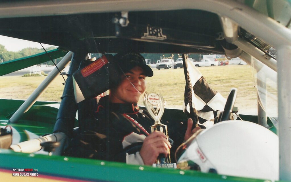 Black and white abstract pattern with concentric circles and wave shapes.