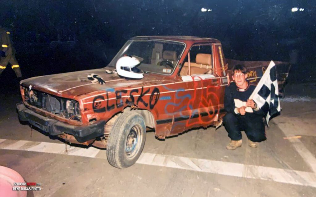 Black and white abstract pattern with concentric circles and wave shapes.