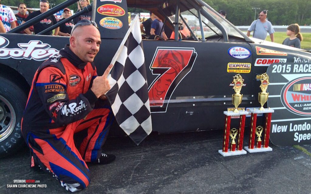 Black and white abstract pattern with concentric circles and wave shapes.