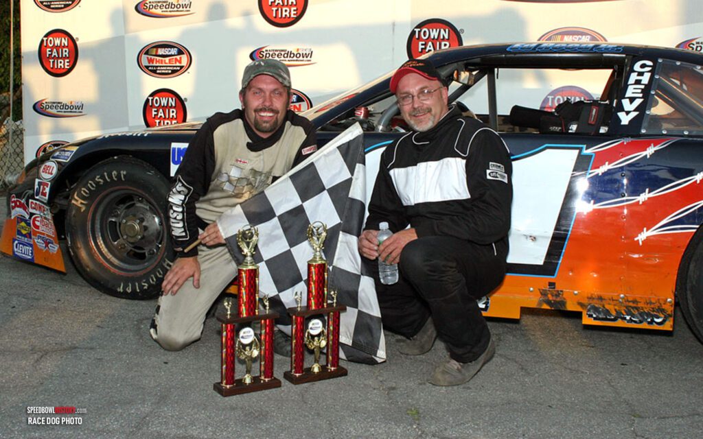 Black and white abstract pattern with concentric circles and wave shapes.