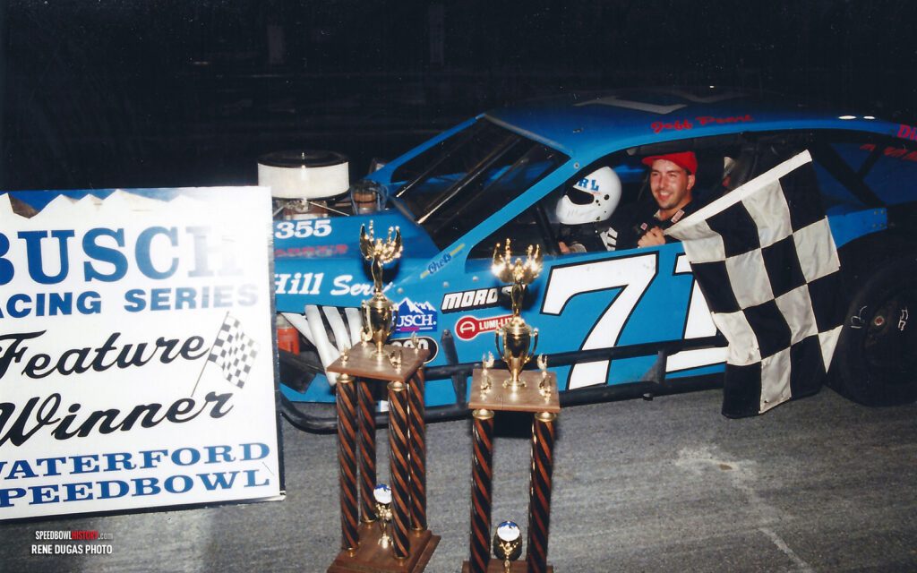 Black and white abstract pattern with concentric circles and wave shapes.