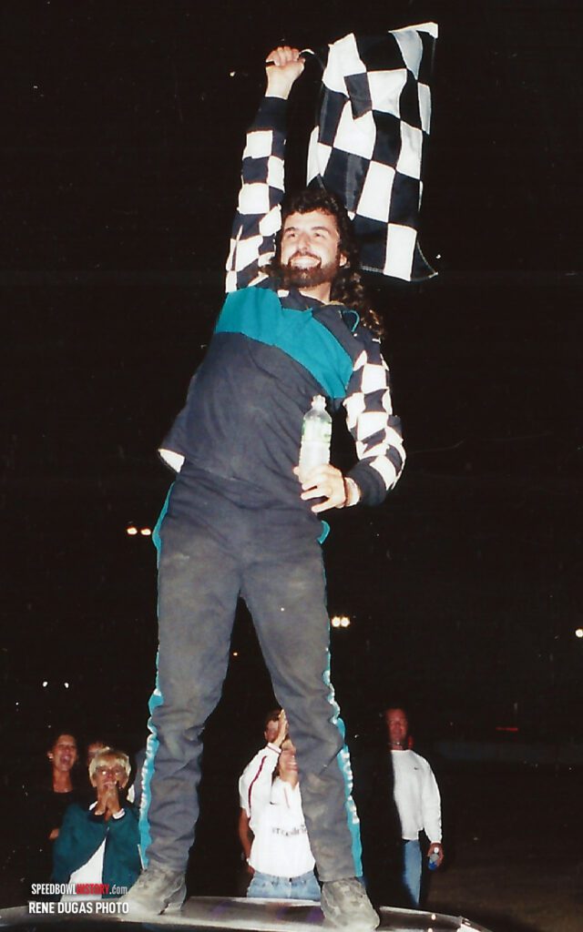 Black and white abstract pattern with concentric circles and wave shapes.