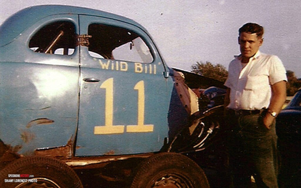 Black and white abstract pattern with concentric circles and wave shapes.
