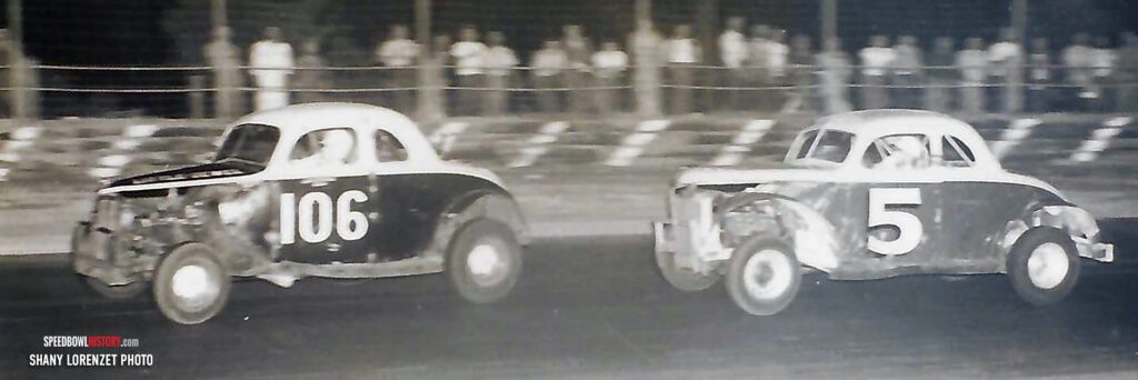 Black and white abstract pattern with concentric circles and wave shapes.