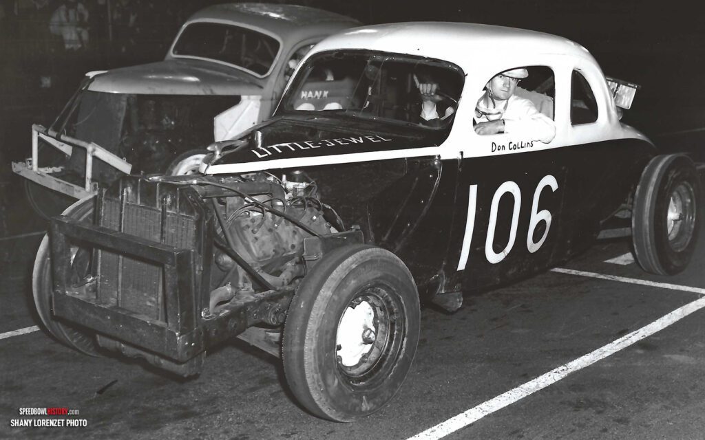 Black and white abstract pattern with concentric circles and wave shapes.