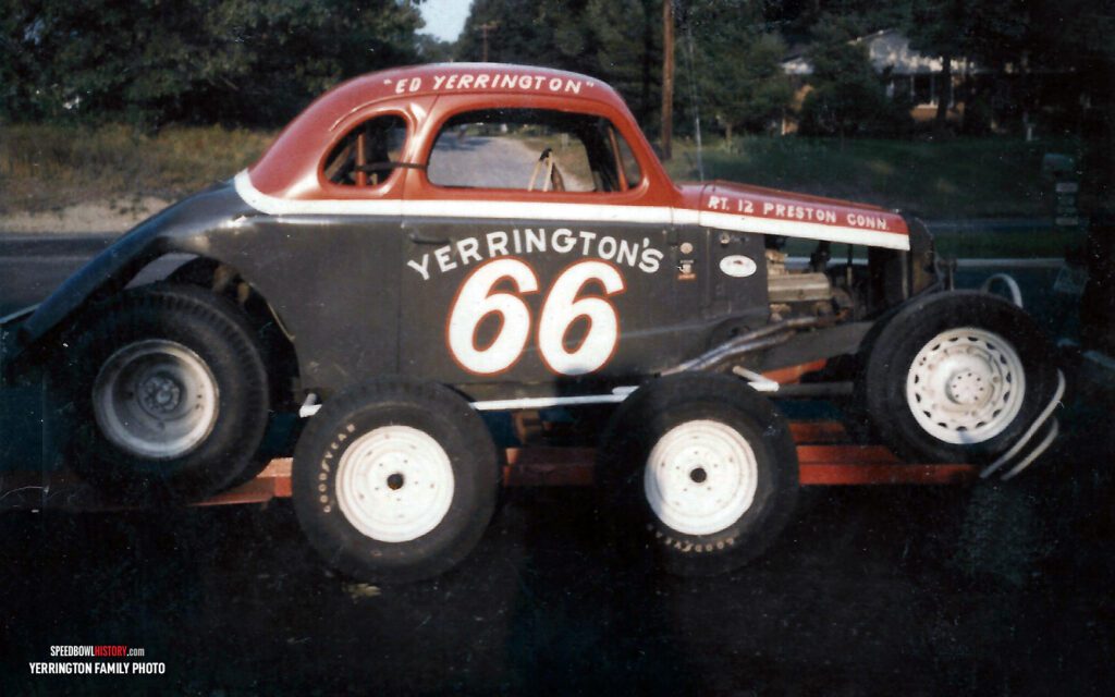 Black and white abstract pattern with concentric circles and wave shapes.