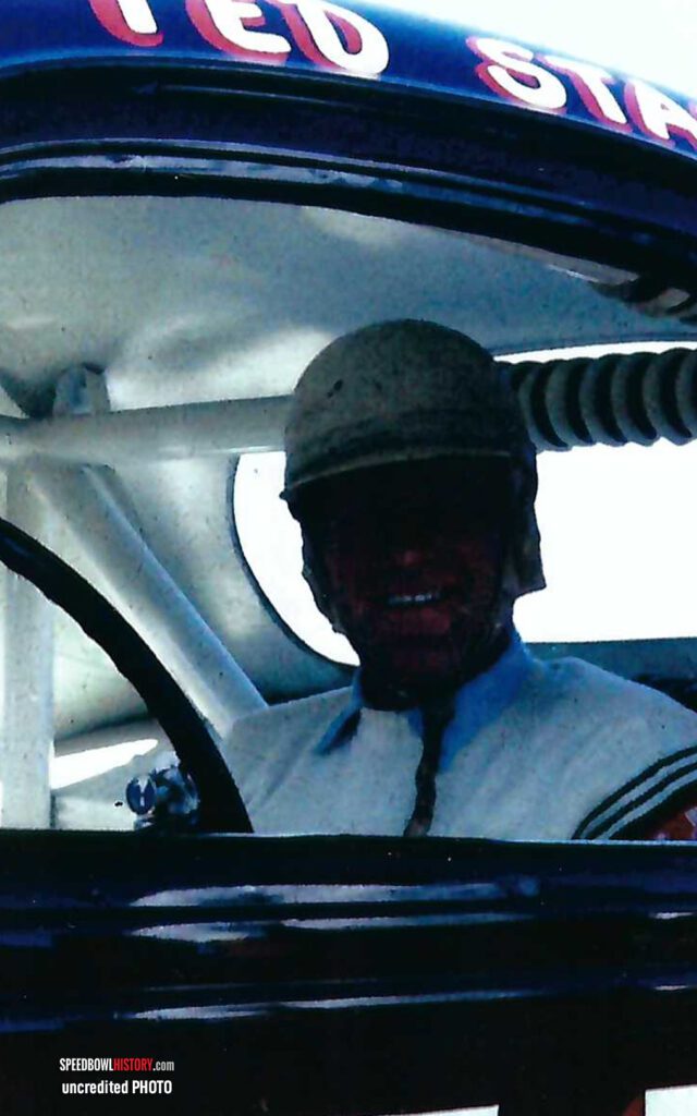 Black and white abstract pattern with concentric circles and wave shapes.