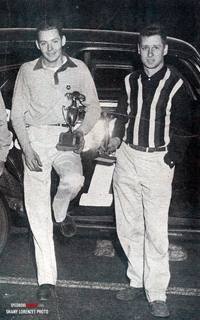 Black and white abstract pattern with concentric circles and wave shapes.