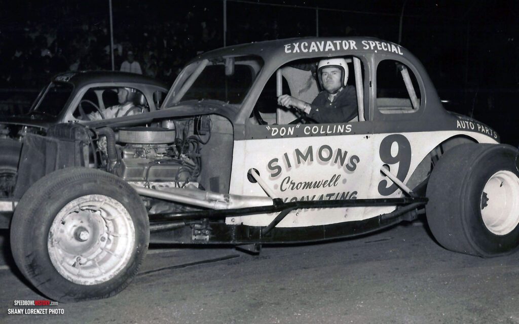 Black and white abstract pattern with concentric circles and wave shapes.