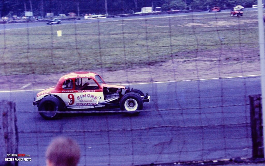 Black and white abstract pattern with concentric circles and wave shapes.