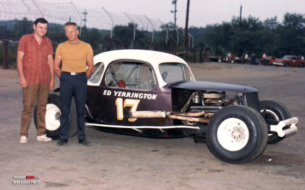 Black and white abstract pattern with concentric circles and wave shapes.