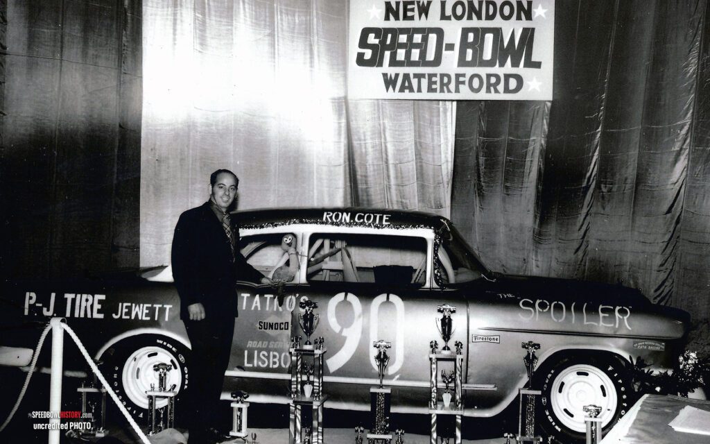 Black and white abstract pattern with concentric circles and wave shapes.