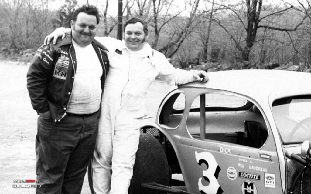 Black and white abstract pattern with concentric circles and wave shapes.