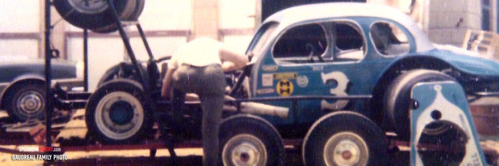 Black and white abstract pattern with concentric circles and wave shapes.