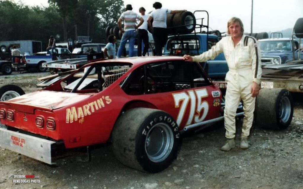 Black and white abstract pattern with concentric circles and wave shapes.