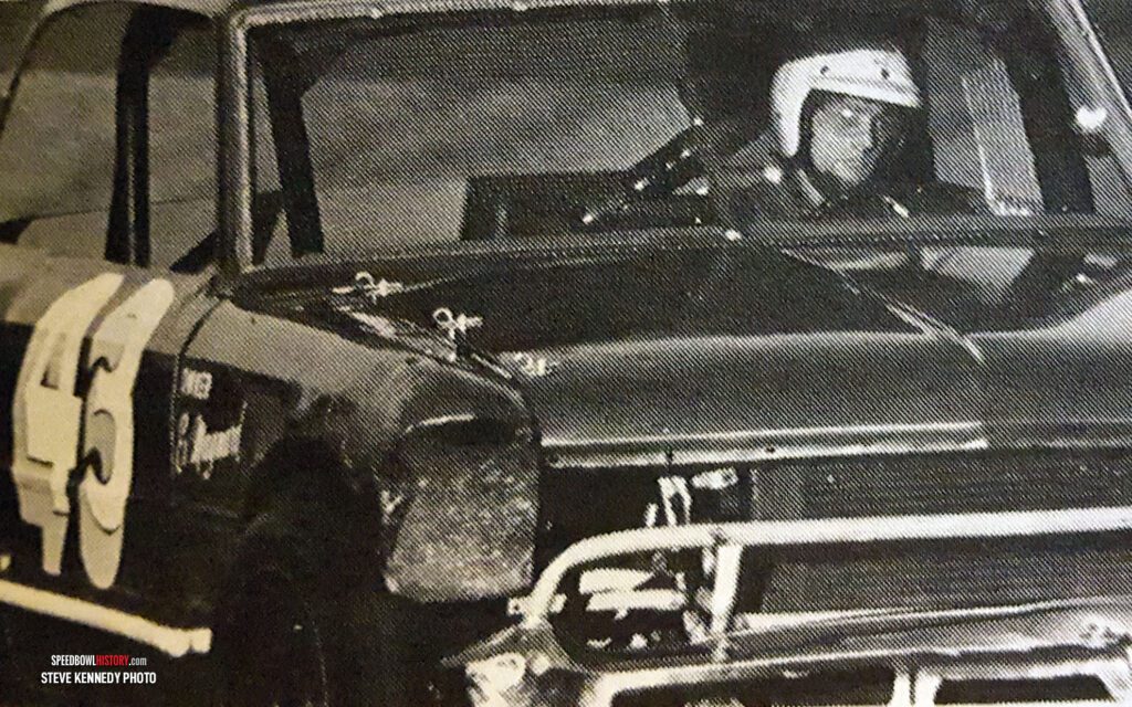 Black and white abstract pattern with concentric circles and wave shapes.