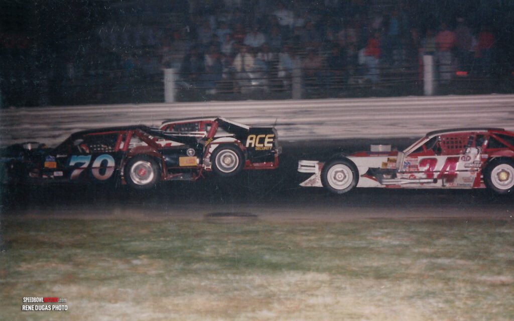 Black and white abstract pattern with concentric circles and wave shapes.