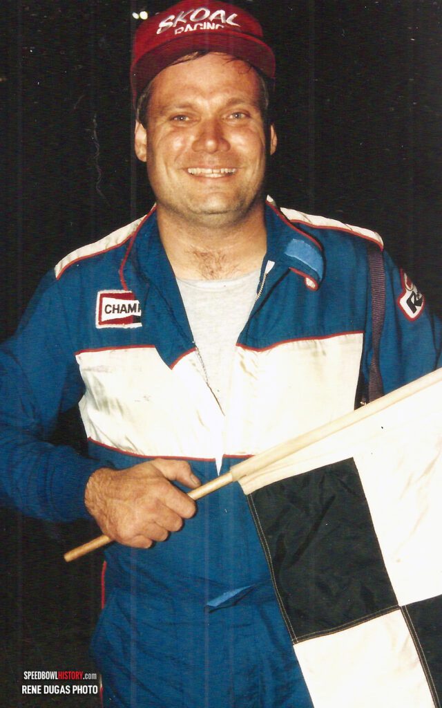 Black and white abstract pattern with concentric circles and wave shapes.