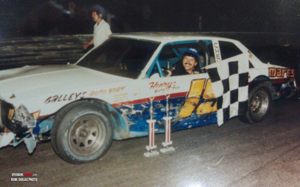 Black and white abstract pattern with concentric circles and wave shapes.