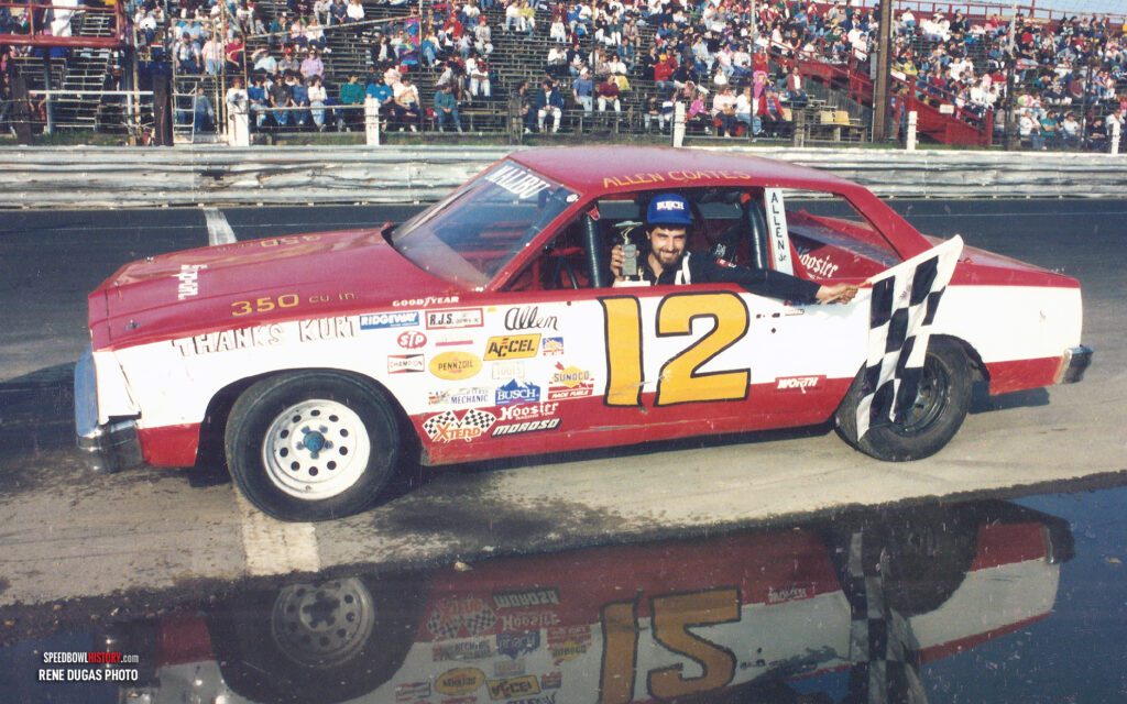 Black and white abstract pattern with concentric circles and wave shapes.