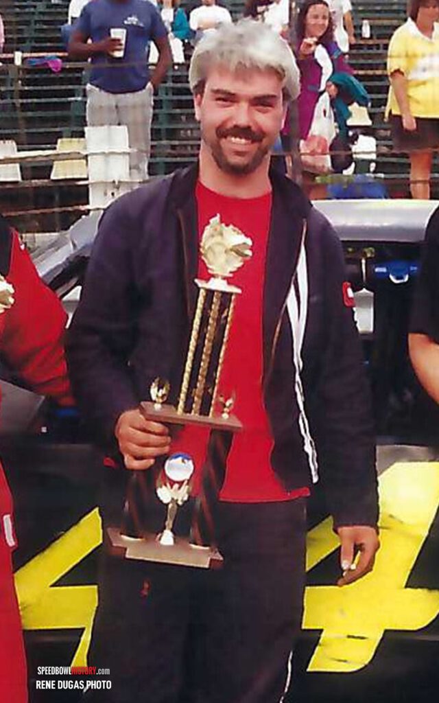 Black and white abstract pattern with concentric circles and wave shapes.