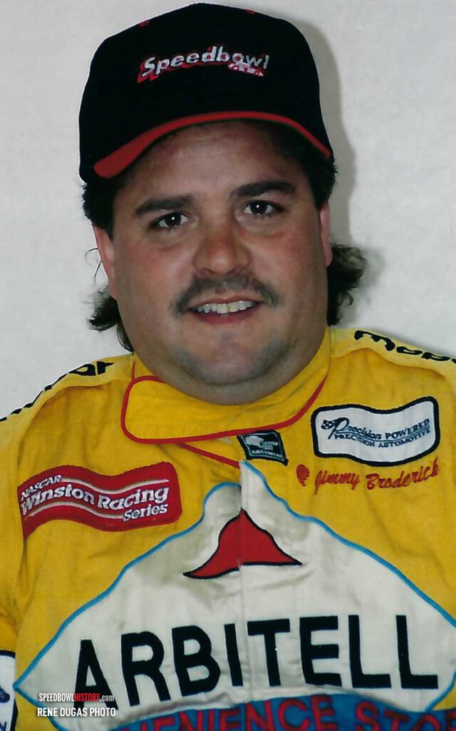 Black and white abstract pattern with concentric circles and wave shapes.