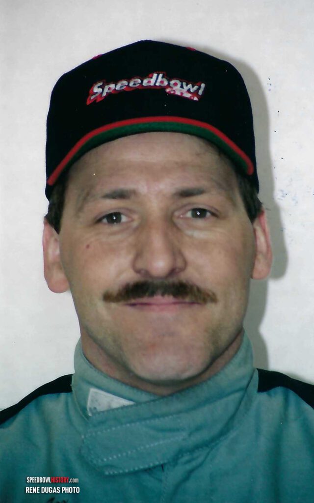 Black and white abstract pattern with concentric circles and wave shapes.