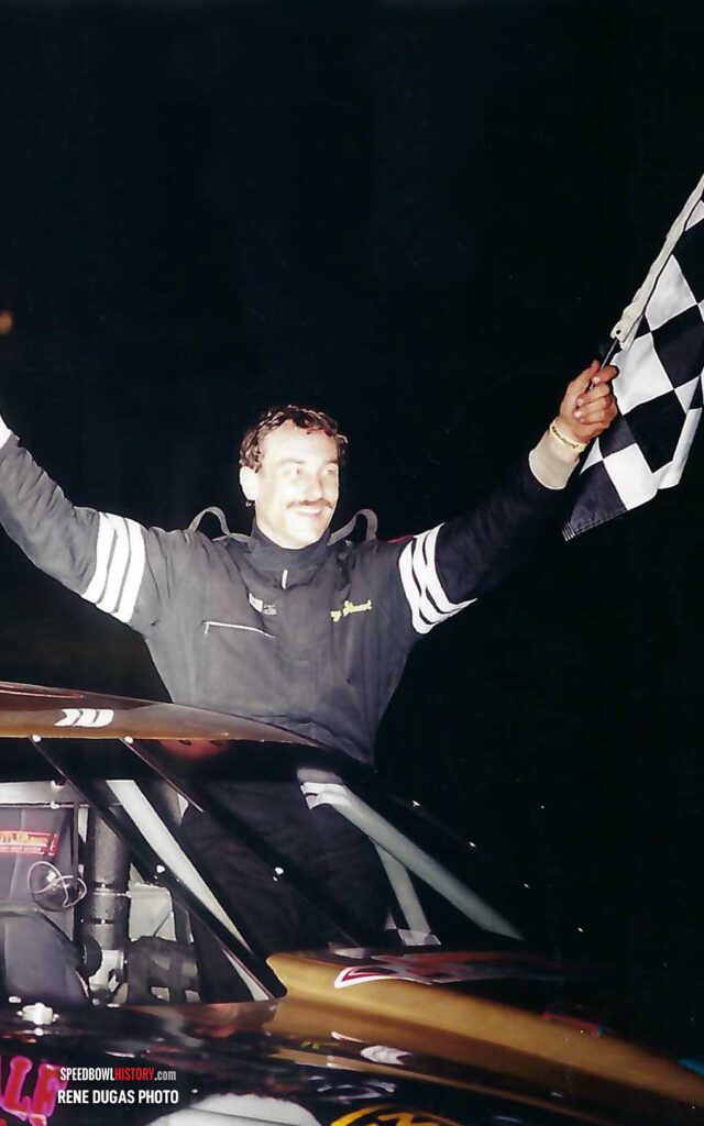 Black and white abstract pattern with concentric circles and wave shapes.