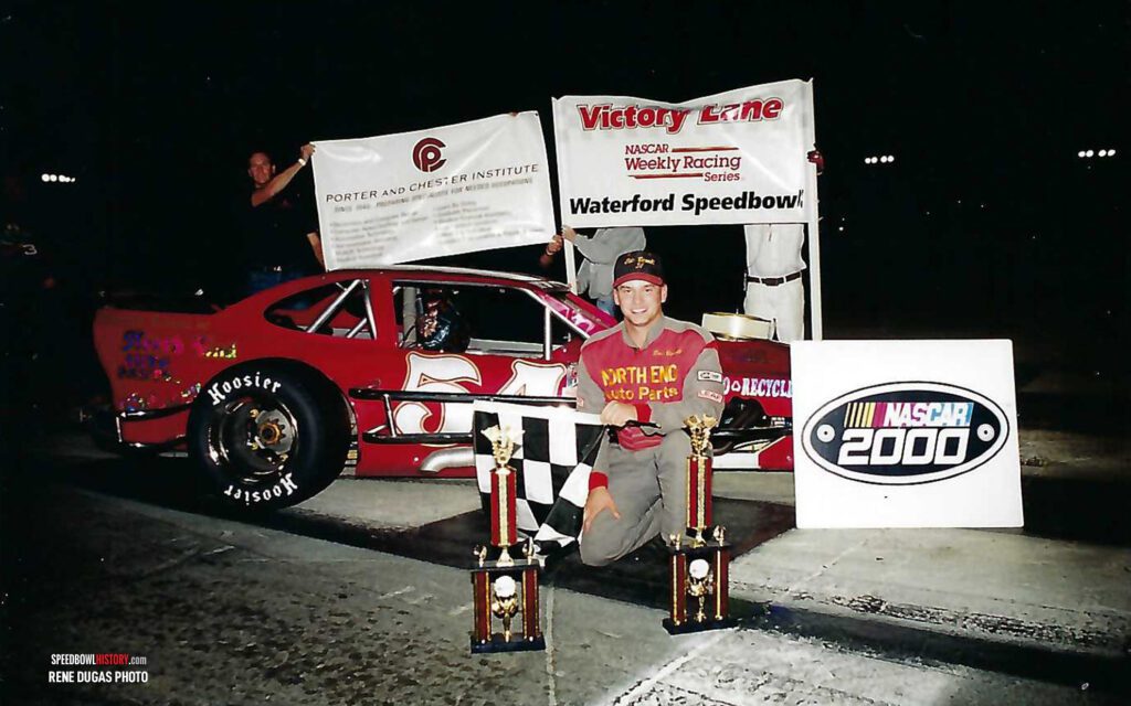 Black and white abstract pattern with concentric circles and wave shapes.