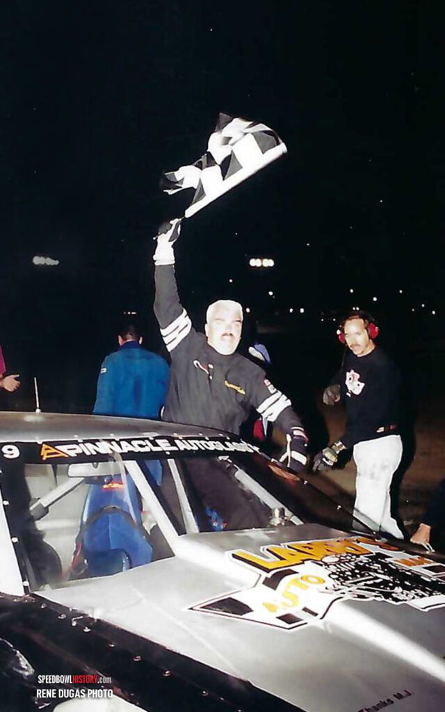 Black and white abstract pattern with concentric circles and wave shapes.