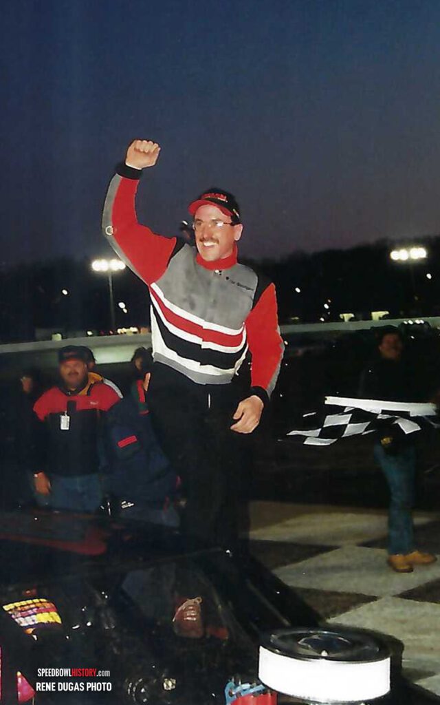 Black and white abstract pattern with concentric circles and wave shapes.