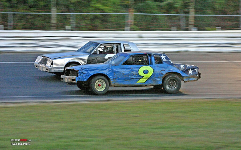 Black and white abstract pattern with concentric circles and wave shapes.