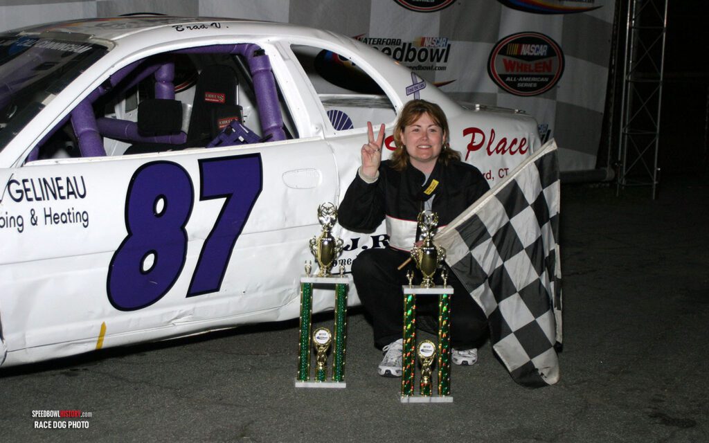 Black and white abstract pattern with concentric circles and wave shapes.