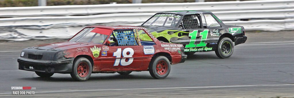 Black and white abstract pattern with concentric circles and wave shapes.