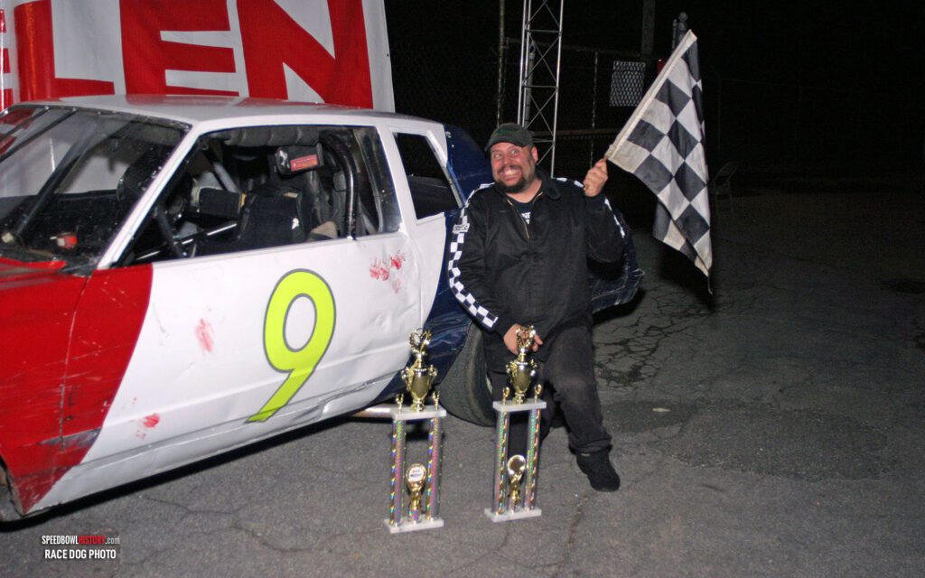 Black and white abstract pattern with concentric circles and wave shapes.