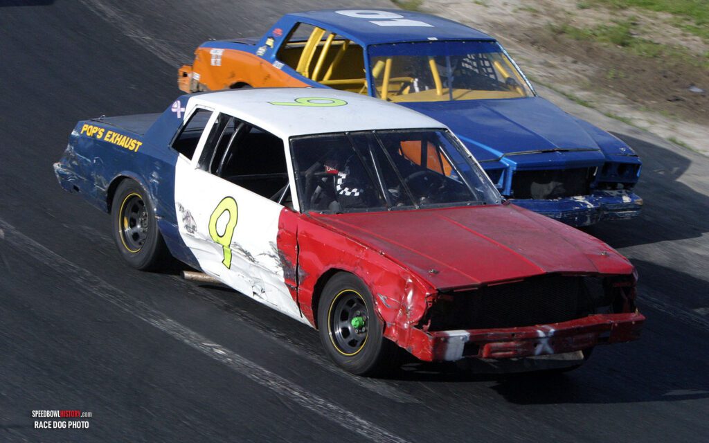 Black and white abstract pattern with concentric circles and wave shapes.