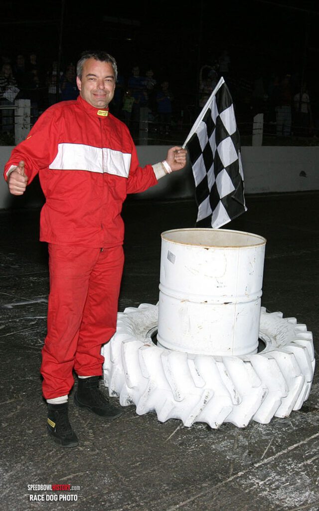 Black and white abstract pattern with concentric circles and wave shapes.